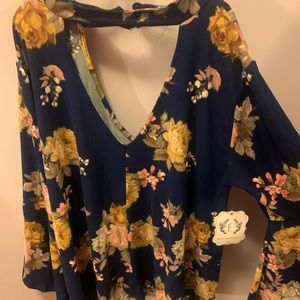 Floral navy blue long sleeve. Tags on boutique shirt. Large